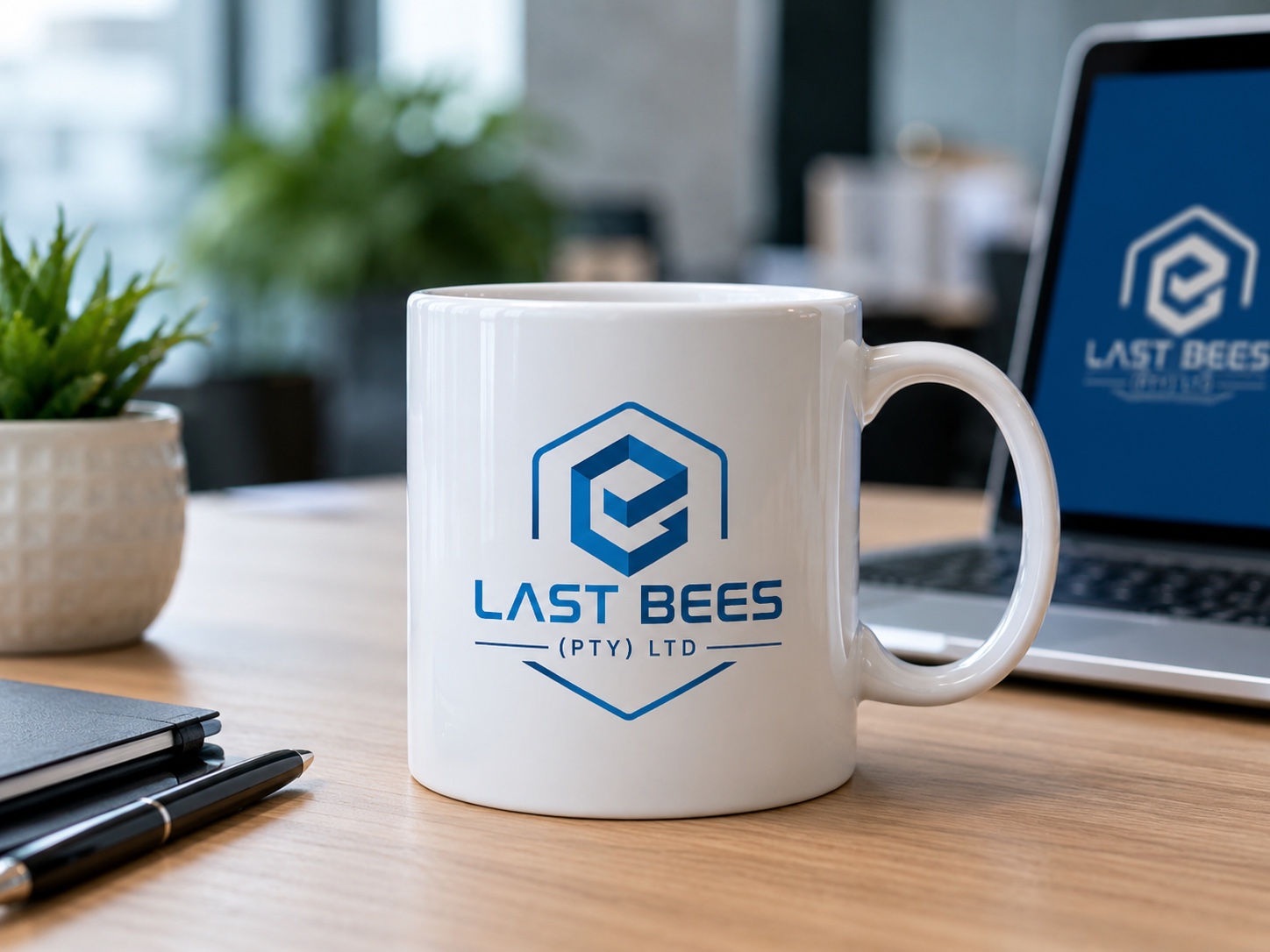 Last Bees branded mug in a professional workspace